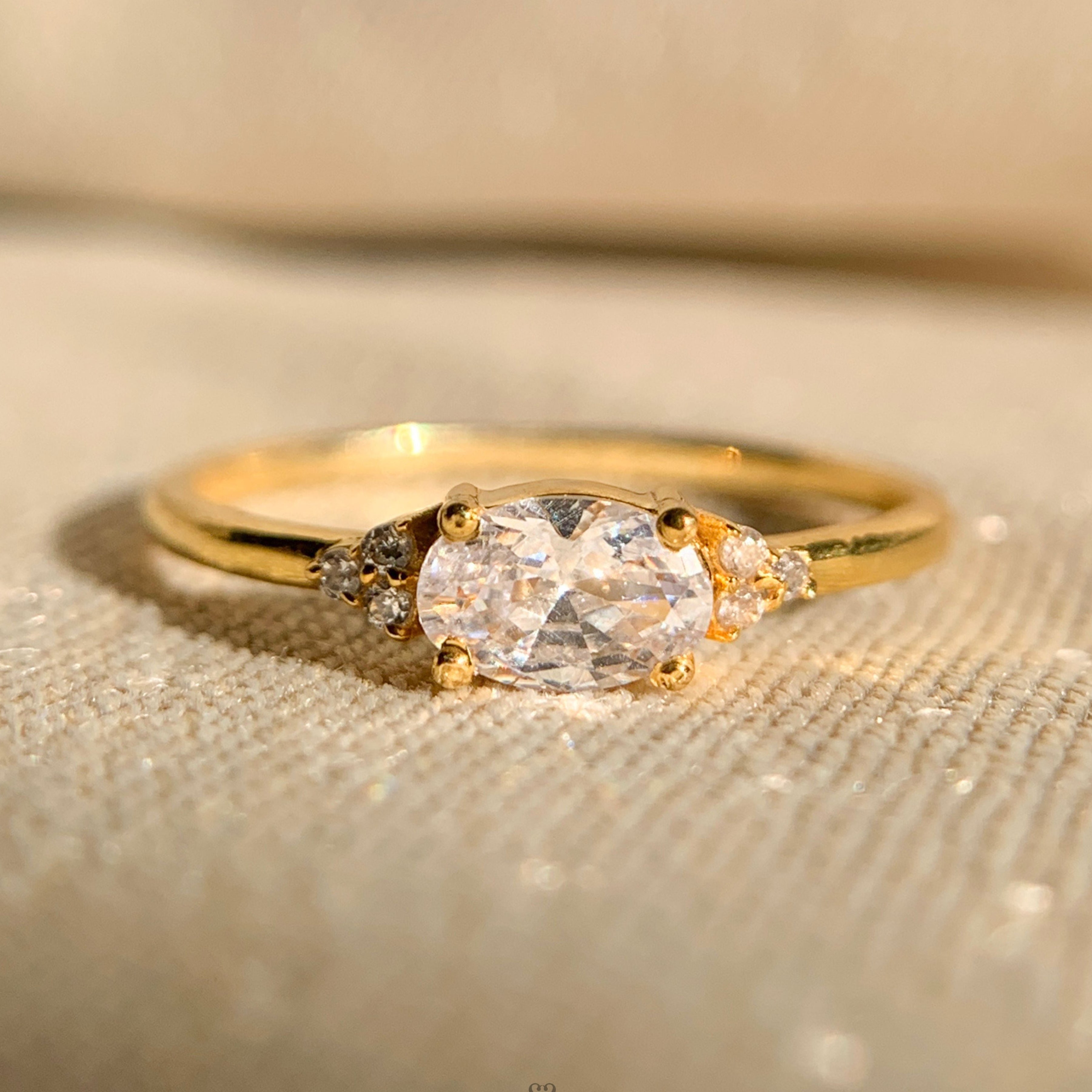 East - West Oval Diamond Engagement Ring